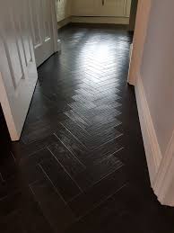 Black Oak Herringbone With Torus White Skirting By Criterion Flooring Flooring Wood Floors Herringbone Laminate Flooring