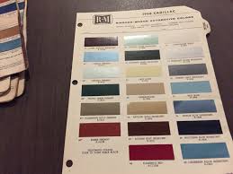 Image result for Starlight Silver 1966 Cadillac