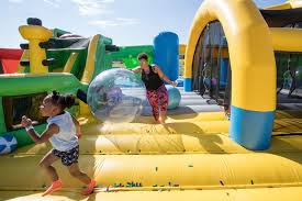 See photos inside 10,000 square foot world's largest bounce house