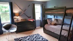 How And When To Redo Your Child S Room Also How To Build A Pallet Bed Hockey Bedroom Hockey Bedroom Decor Hockey Room