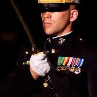 A U.S. Marine officer salutes with his Mameluke sword