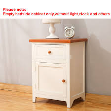 Neat and stylish, this chest of drawers is a simple storage solution that also adds a hit of contemporary design. Wooden Bedside Cabinet Simple Modern Wood Night Table Living Room Bedroom Nightstand Storage Cabinet One Door Home Furniture Nightstands Aliexpress