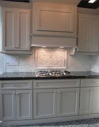 Gray Cabinets Black Counters Slate Herringbone Floor Marble Hex Backsplash Accent Trendy Kitchen Tile Black Granite Kitchen Grey Cabinets