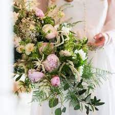 collaborative shoot at slane caslte image by paul kelly pk3studios flowers by moira cascade garden inspired bouquet garden inspired flowers bride style