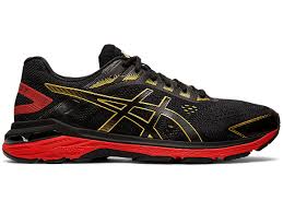 Black and gold running shoes. Women S Gt 2000 7 Black Rich Gold Running Shoes Asics
