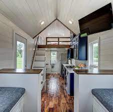 Our First Kokosing Build She S Still A Legend The Kokosing Is A 24 Ft Tiny House On Wheels Design Modern Tiny House Tiny House Living Small House Storage