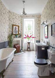There is a clawfoot tub centrally positioned which is a classic design in vintage styled bathrooms. Vintage Bathroom Design Houzz