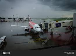 Airasia excess, overweight, oversize baggage fees. Air Asia Thailand 21 Image Photo Free Trial Bigstock