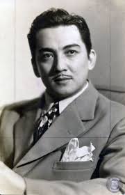 Does anyone know who this guy is? I'm not sure if he's a local celebrity,  or national. Thanks! BTW, he's in a photo with Frank Sinatra, Jimmy  VanHeusen, and Curly Vadeboncoeur. ANSWER