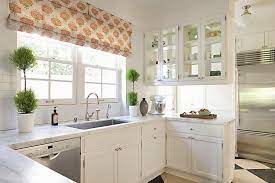 Those were the first to be removed in that kitchen. Glass Front Cabinets Hanging Over Kitchen Peninsula Transitional Kitchen