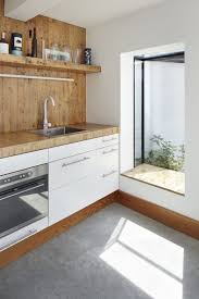 The Travertine Window Seat Feature Wall Bench Top And Floating Shelf Match The Wood Skirting Board P Kitchen Window Design Kitchen Window Beautiful Kitchens