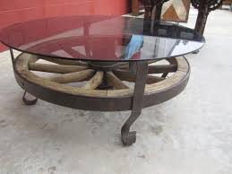 Quickly find the best offers for coffee table on wheels uk on newsnow classifieds. Wagon Wheel Coffee Table Vintage Antique Wagon Wheel Coffee Table Antique Furniture From Buyingl Rustic Furniture Coffee Table Vintage Wagon Wheel Decor