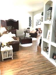 Tavern Oak Laminate Flooring From Lowes Basement Remodeling Small Basement Remodel Basement Remodel Diy
