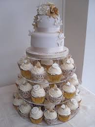 Silver Gold And White 2 Tier Cake With Cupcake Tiers Wedding Anniversary Cakes 50th Wedding Anniversary Cakes Golden Wedding Anniversary Cake