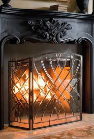 The larger screen is a brown antique bronze metal. Victoria Beveled Glass Fireplace Screen Frontgate Glass Fireplace Screen Glass Fireplace Fireplace Screen