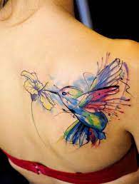 25 Creative Beautiful Hummingbird Tattoo Designs And Their Meanings Hummingbird Tattoo Flower Tattoo Shoulder Tattoos