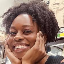 Who can provide grant writing services for a nonprofit youth empowerment  and adult literacy program?