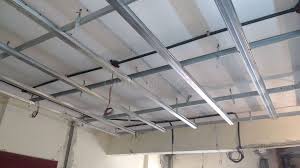 Suspended or drop ceiling tiles rest in a grid system suspended from ceiling joists. Aluminum False Ceiling Framing False Ceiling Design Ceiling Design Ceiling