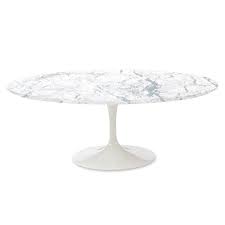 Table features an original powder coated steel base with a refinished walnut top. Eero Saarinen Tulip Table Dining Table Oval Top Marble White Base White