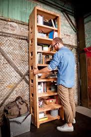 The piece of solid wood is where he fastened the rail. Good Idea Bookshelf With A Built In Ladder Improvised Life