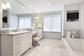 Stunning carrara marble shower with marble subway tile shower surround and wall of polished nickel chrome shower jets. Marble Flooring Beautiful Design Ideas Designing Idea