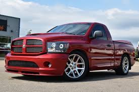 2010 genesis coupe, modded, traded (quad cab) i avg 8 mpg in town, i work 4 miles from my house. 2006 Dodge Ram Srt 10 Adrenalin Motors