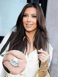 Kim Kardashian S 20 Plus Carat Engagement Ring Sells For Less Than Half Of What It Cost Celebrity Engagement Rings Kim Kardashian Engagement Ring Kim Kardashian