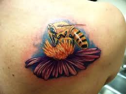 37 Honey Bee Tattoos With Mysterious Meanings Tattoos Win Bee And Flower Tattoo Bee On Flower Flower Tattoo Back