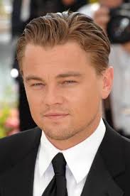 Dicaprio's hair is combed into a deep side part but given texture to avoid looking too slick. Leonardo Dicaprio Hairstyle New Leonardo Dicaprio Hair Leonardo Dicaprio Now Leonardo Dicaprio