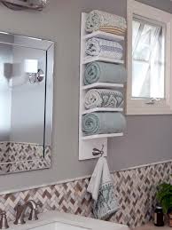 Wire holdings are on both sides, and a copper pipe is between the wires. How To Make An Angled Shelf Towel Rack Diy