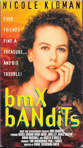 Amazon.com: BMX Bandits [VHS] : David Argue, John Ley, Nicole Kidman,  Angelo D'Angelo, James Lugton, Bryan Marshall, Brian Sloman, Peter Browne,  Bill Brady, Linda Newton, Bob Hicks, Guy Norris, John Seale, Brian