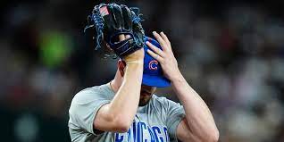 Chicago Cubs pitcher forced to change glove because American flag patch was  considered a distraction