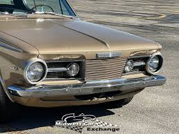Image result for Gold 1965 Barracuda