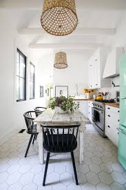Hefty beamed ceilings and unique lanterns lend the classic look to the kitchen without making it look obsolete. 20 Modern Farmhouse Kitchen Ideas For Your Next Reno