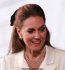 The Princess in Self-Portrait with Vintage Jewelry for VE Day Concert