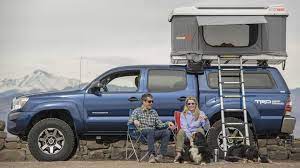Roof top pop up camper. Turn Any Car Into A Camper With This Pop Up Roof Tent