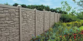 Low fencing creates a barrier to entry without blocking the view. Faux Stone Fences Improve Home Value Don T Break The Bank