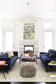 Perhaps it's the texture or the way the light shines on the fabric, but the couch tends to take the center of attention. Domaine S Favorite Living Rooms Of 2014 Blue Sofas Living Room Blue Sofa Living Modern Living Room Interior