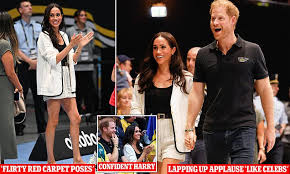 Prince Harry and Meghan Markle are acting like a 'celebrity power couple'  at Invictus Games