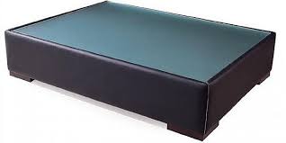 Leather ottoman coffee table provides an opportunity to put their feet up and relax, so the rooms in which these seats or stools are placed much more warm and relaxing. Modern Leather Coffee Table With Glass Top And Wooden Legs