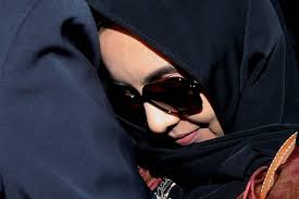 Adnan othman / the rhythmn boys. Nazrin S Widow Exhibits An Expressionless Face During The Fire Witness