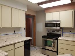 Painting Kitchen Hgtv Sherwin Williams Nebulous White Peel And Stick Wallpaper Rental Kitchen Update Kitchen Cabinets Hgtv Kitchens