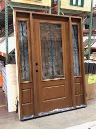 Maybe you would like to learn more about one of these? The Essex Decorative Iron Scroll Door With Sidelites Gives Homeowners Maintenance Free Ease In Addition To The Exterior Doors Fiberglass Exterior Doors Doors