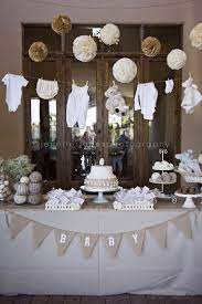 Opt for a white and metallic color scheme to make the party chic and shimmery. Vintage Lamb Themed Neutral Baby Shower Jennifer Jones Photography Gender Neutral Rustic Cre Baby Shower Vintage Rustic Baby Shower Burlap Baby Showers