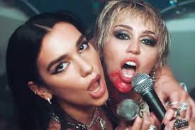 Miley ray hemsworth , born: Miley Cyrus And Dua Lipa Hit The Road In The Video For Prisoner
