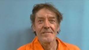 Naked man arrested for setting house