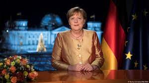 German chancellor angela merkel grimaces on stage during a campaign rally on september 26, 2009 at the treptow arena in berlin. Angela Merkel S New Year S Speech Toughest Year Of Chancellorship News Dw 30 12 2020
