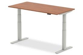 This standing desk offers three height settings from 18 inches to 65 inches which are perfect for anyone with a wide range of heights in their home. Height Adjustable Rectangular Walnut Office Desk 4 Sizes Nova Range