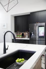 A hardwearing, heat resistant and hygenic glass surface is available in either white or black. Featuring A Barely There Palette This Trend Centered On Subtlety Glorifies Nature Water And Organ Black Kitchen Sink Kitchen Sink Design White Kitchen Design