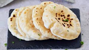 Like most leavened breads, this one consists primarily of flour, water and yeast. Gluten Free Pita Bread Easy Flatbread Recipe Elavegan Recipes